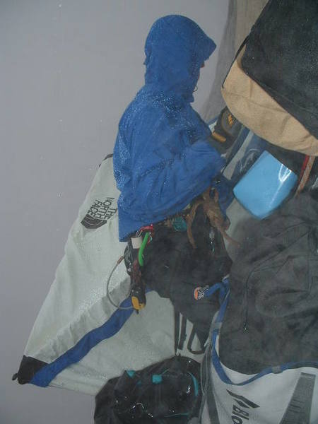 Robert Hecker setting up portaledge in not-so-nice weather