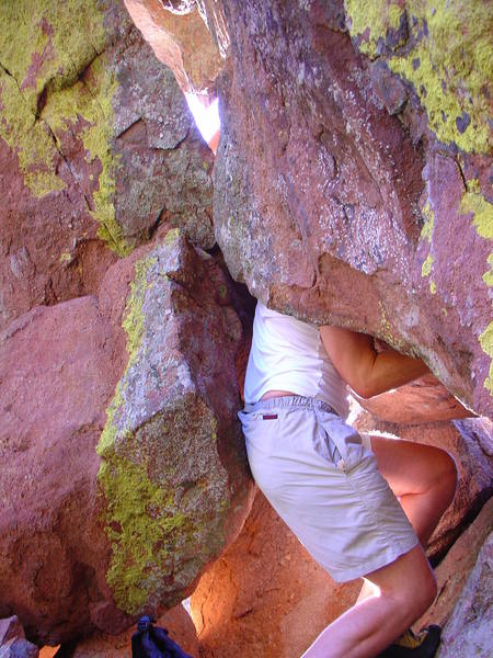The 'rebirthing channel' that leads to the the walk off descent slab mentioned in Mark Overson's comment.
