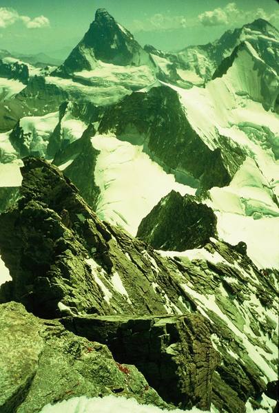 Looking back down the Southwest Ridge of the Zinal Rothhorn with the Matterhorn in the background (7/90).