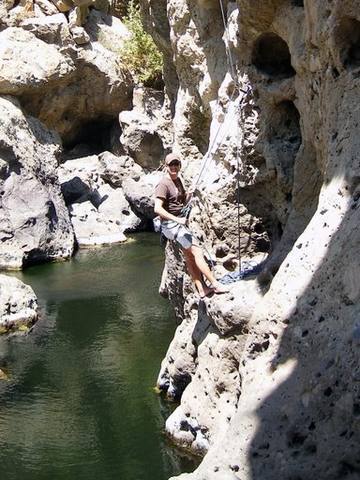 The semi-hanging belay start of Power Grid (5.10a)