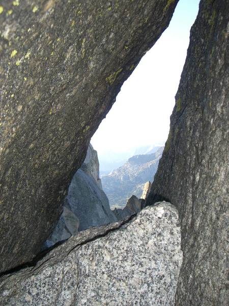 The Hole on East Ridge route of Wolf's Head. A tight squeeze through this one.