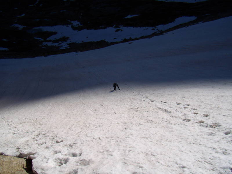 Jordan Griffler approaching Sykes Sickle in the morning light. RMNP June 2007.