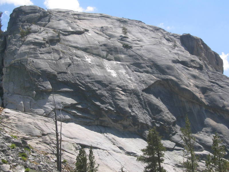 North side of Pywiak Dome. Climbers on Aqua Knobby crack (the left running 45 degree crack above the roof w/out the shrubbery)