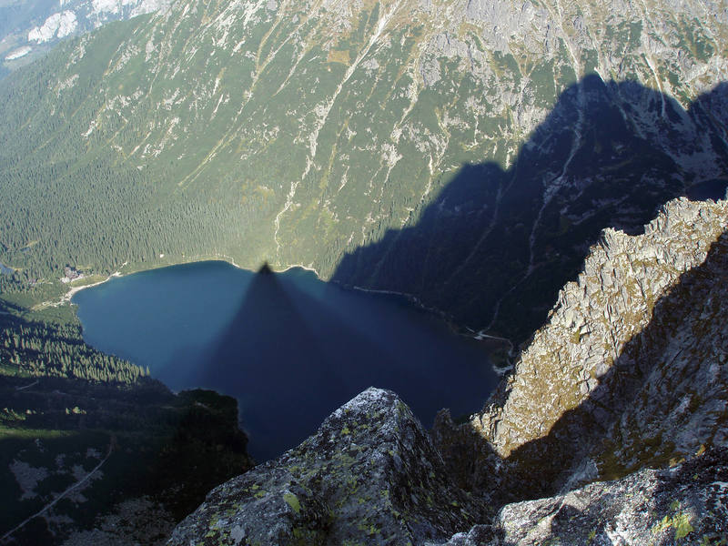 View from the summit. Mnich casts its shadow over Morskie Oko lake.