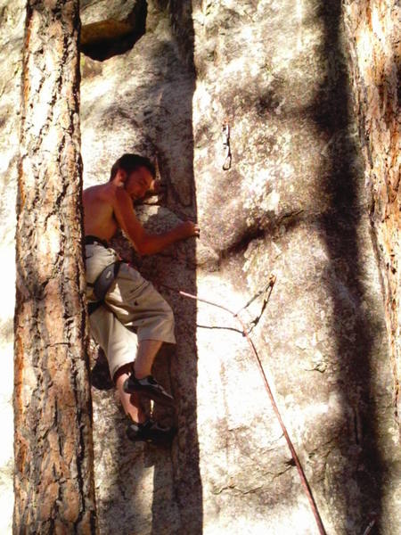 The tree on behind my back has been cut down so it is a pretty easy way to find this route. To the left is a great 5.12a The Wiz.