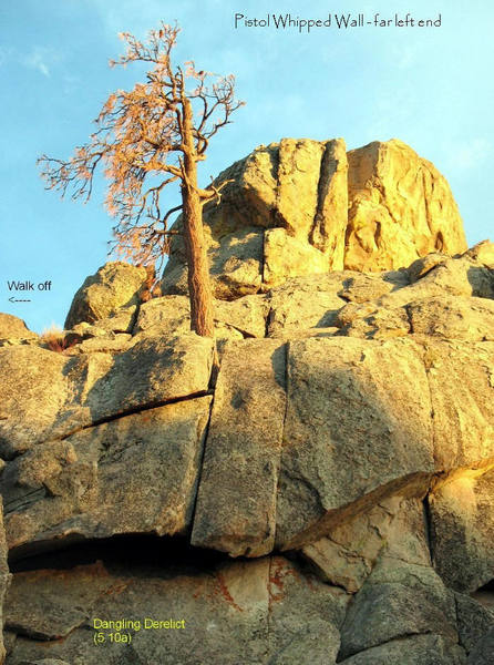 Dangling Derelict (5.10a) is the slab to roof crack below the pine tree.