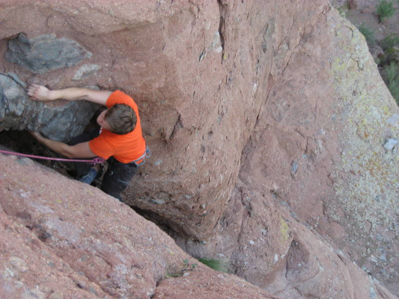 Brian climbing the short chimney section