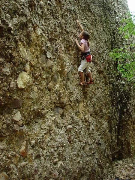 My 10 yr old climbing Crunchy Bug. Good shot of the right end of Road Kill Wall. There are 4 routes here in the .7/.8 range, all about 30 feet long.<br>
<br>
Photo by Perin Blanchard