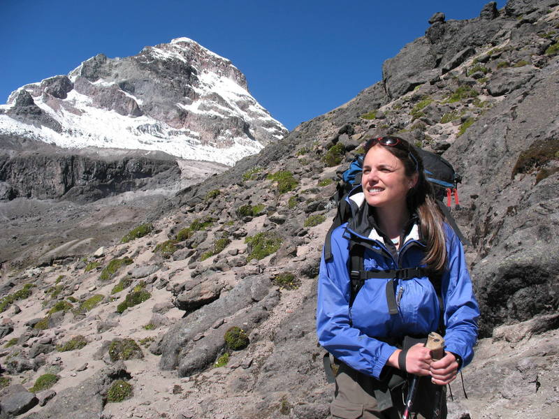 Nancy Bell on the way up Illiniza Norte with Illiniza Sur in the background.
