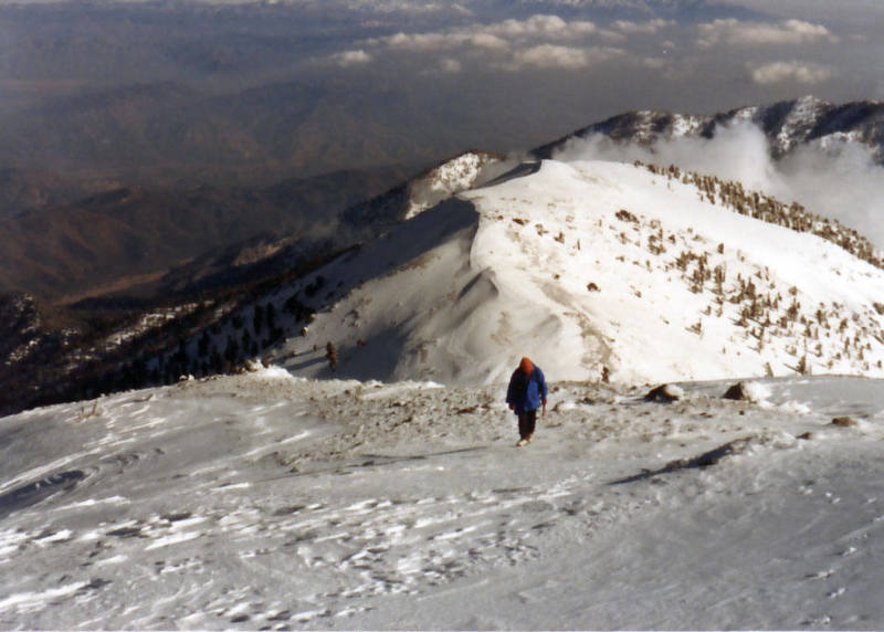 Slogging up to the summit taken by Tony T, who's already there (surprise, surprise).