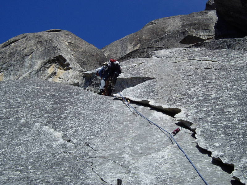 Laybacking to surmount the step in the upper corner.