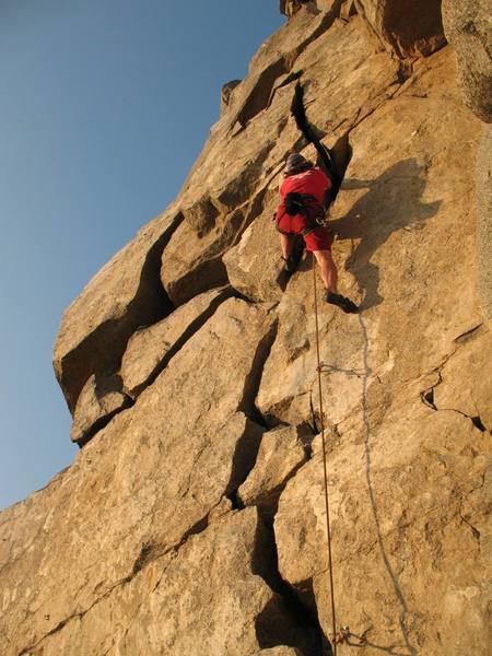 Shadow dancing up Shattered Dreams (5.10c), Riverside Quarry.