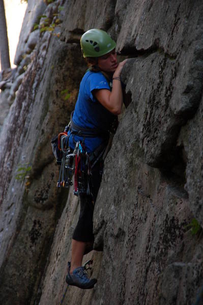 Krista pulling the first moves to the first horizontals before reaching the tree.