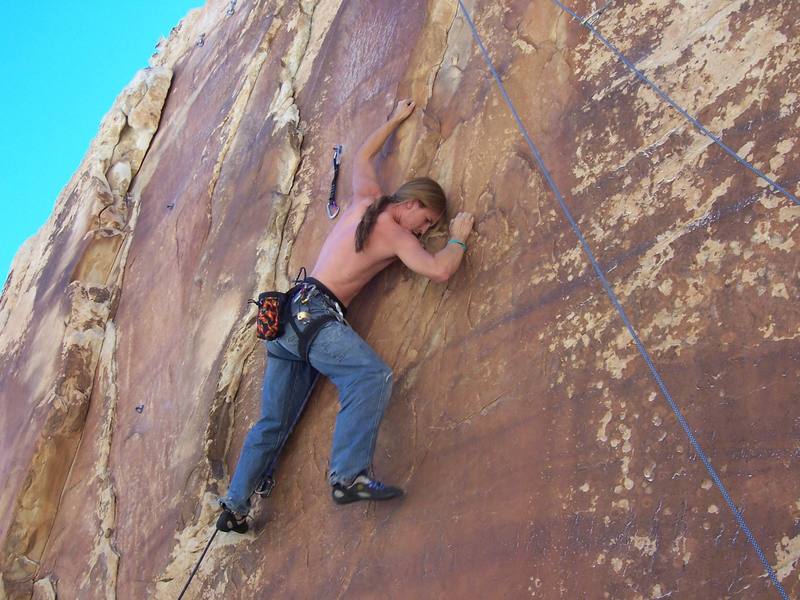 Michael Kimm on the first ascent of Pornographic Priestess.