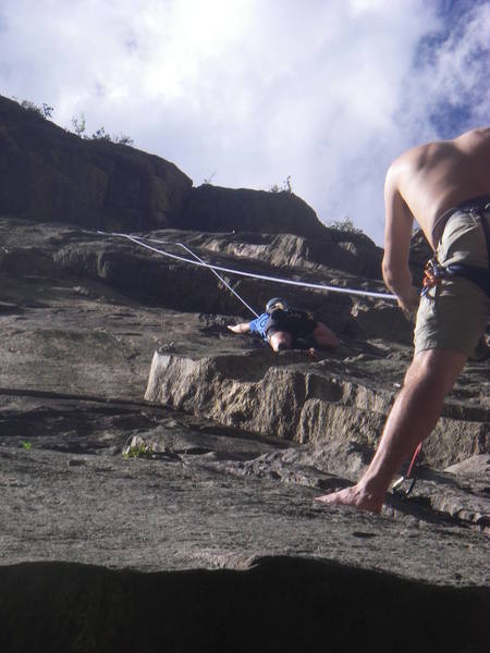 Me belaying lil sis up Guppy. Notice that I'm 10 feet above the pod on at a hanging belay because a 60m ROPE WILL NOT REACH THE POD.
