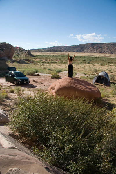 Erica working out her her Yoga stretches in our beautiful campsite.