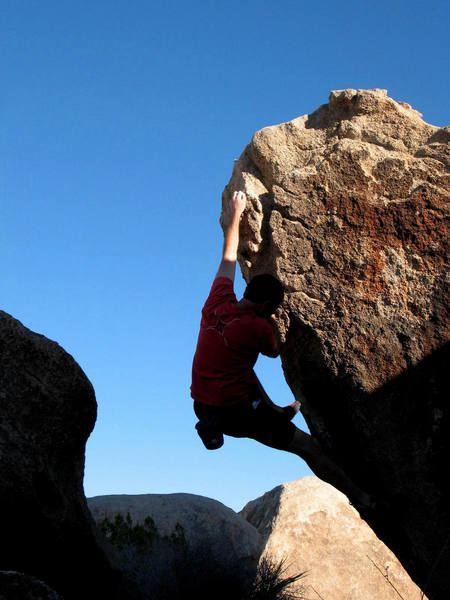 Past the crux on Picture Perfect (V1), Joshua Tree