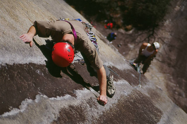 Brian Abram, leading pitch 2 of Dinkus Dog on the South Side of Looking Glass. Kyle Sox is belaying.