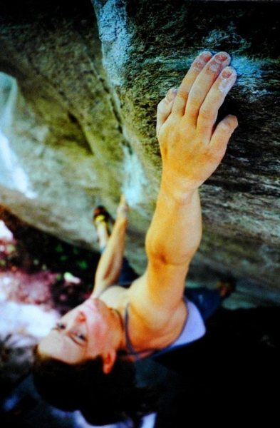KK Gregory pulling hard on the perfect sandstone at Lost Cove, Boone, NC.