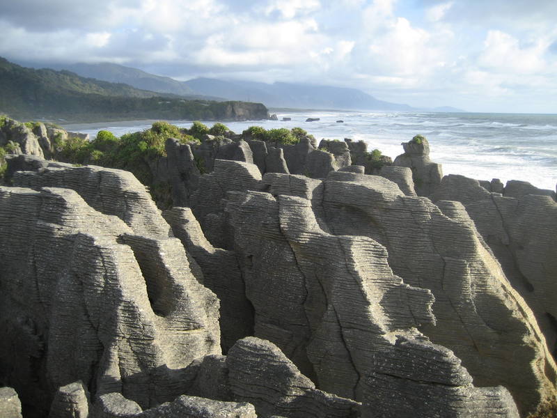 The aptly named Pancake Rocks of Punakaiki on the west coast.  At high tide, there are some impressive blow holes here...