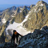 Nat on the Grand Teton, Upper Exum Ridge with the Middle Teton in the background.
