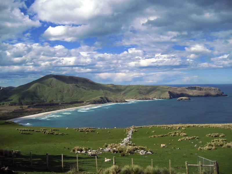 The Otago Penninsula protects Dunedin from rough weather from Antarctica. In 2006, several gigantic icebergs broke off from Antarctica and floated right past this spot.