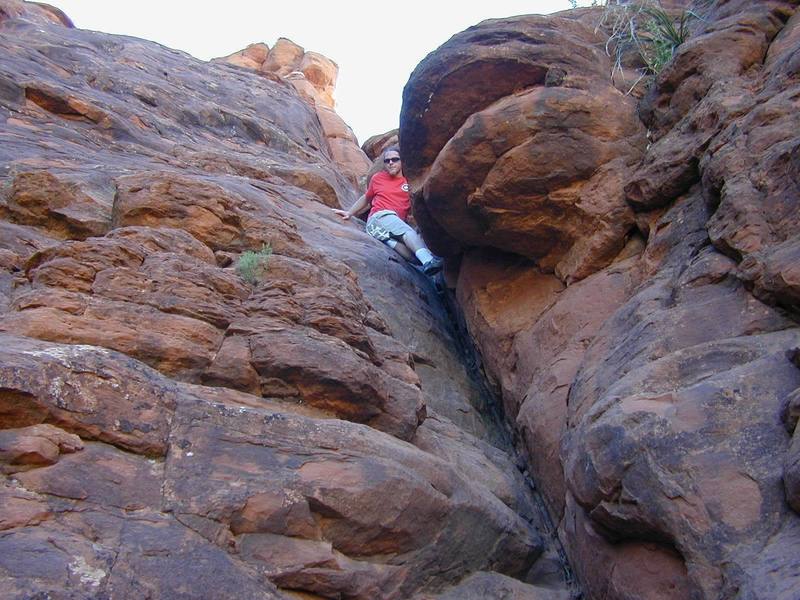 My son Jon at the tricky spot in the chute. June 2004