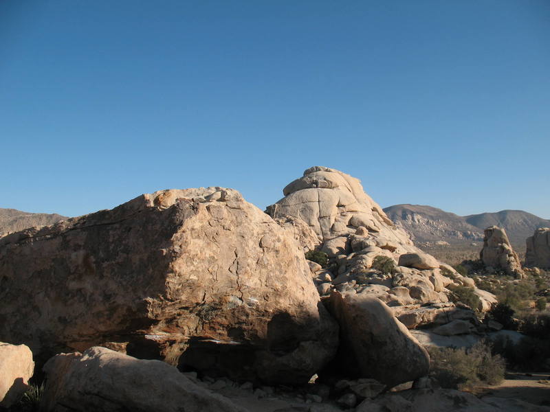 The Lizzie Boulder with the large mass of The Blob in the background.