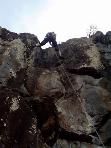 Amy resting after a fall only 10 feet from the top on her first 5.10 lead!