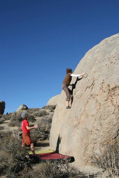 Julie enjoying the slabby face of Ranger Rock.