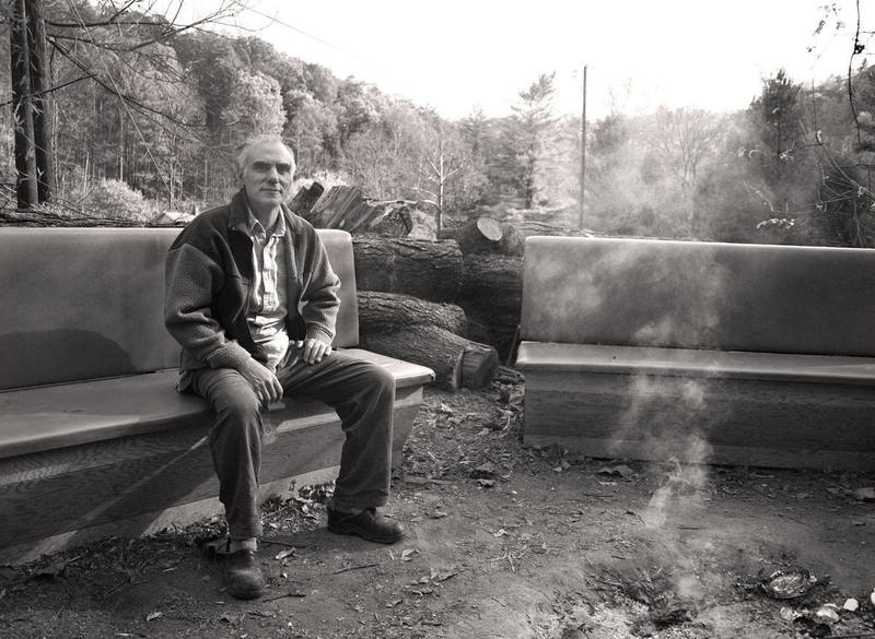 Miguel Ventura, owner and founder of Miguel's in the Red River Gorge, sitting by last night's fire.
