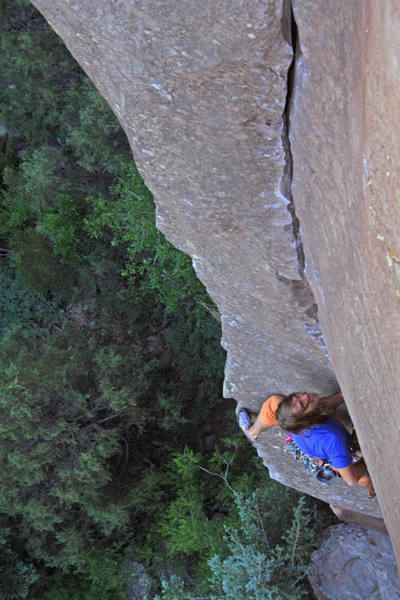 Milking a small but great left foothold near the crux of The Prow. Photo by Jordan M.