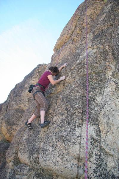 Julie cruising after the crux of Step Child, 5.8