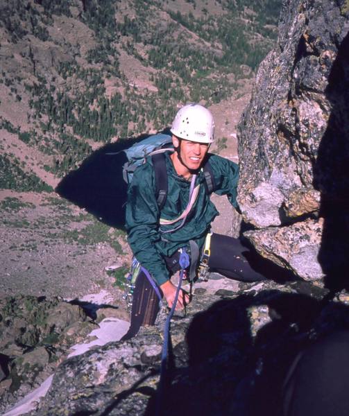 Tony Bubb summits on the Direct Middle Buttress (5.9) of Hallett Peak. Photo 1998 by Rich (?).