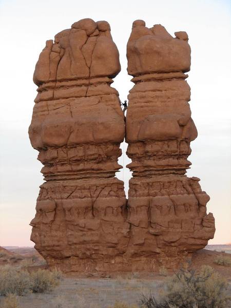 Maura Hahnenberger climbing hoodoos in the San Rafael Swell.