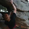 coming off a tricky dyno bouldering at Three Sisters Open space, Evergreen Colorado