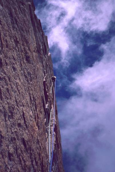 Joseffa Meir leads above on the sea of Granite that is encountered on any Diamond route. Photo by Tony Bubb, 2001.