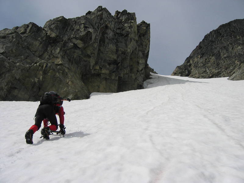 Heading up to the steepest and narrowest section of the initial snow field.  Photo by Ted, August 2007.