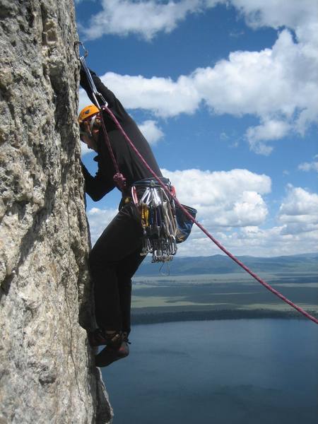 Dan McCool at the crux move, the crux pitch<br>
Photo by Harvey Miller