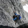 Glenn T. follows the second pitch of the BC, which climbs this 5.7 corner crack