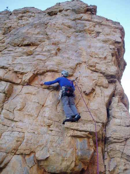 If you blow up this picture, you can see the second bolt, just below a small, downward-pointing, chalked up flake. You can also see the rap chains dangling at the skyline.