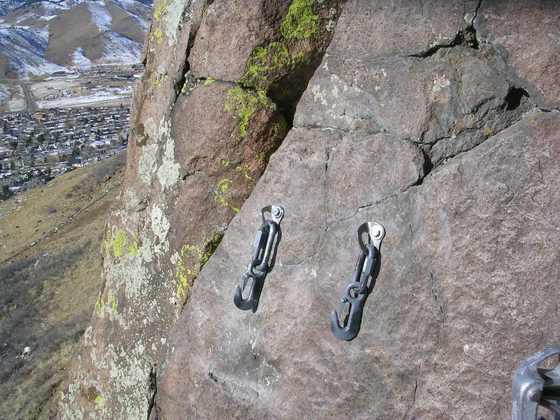 Winch Hooks from Home Depot installed on Golden Cliffs. See my comment below for details of what to buy if you want to help solve the problem of worn anchors. The quick links and hooks can go on Fixe rings too. Just clip in and lower. Much thicker than "fixed" carabiners and easy to replace.