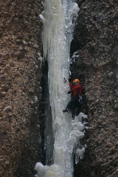 The Swiss Miss, screwing around on Maple Syrup's WI5+ pillar. One can see a taste of the climb's namesake coloration in this pic.