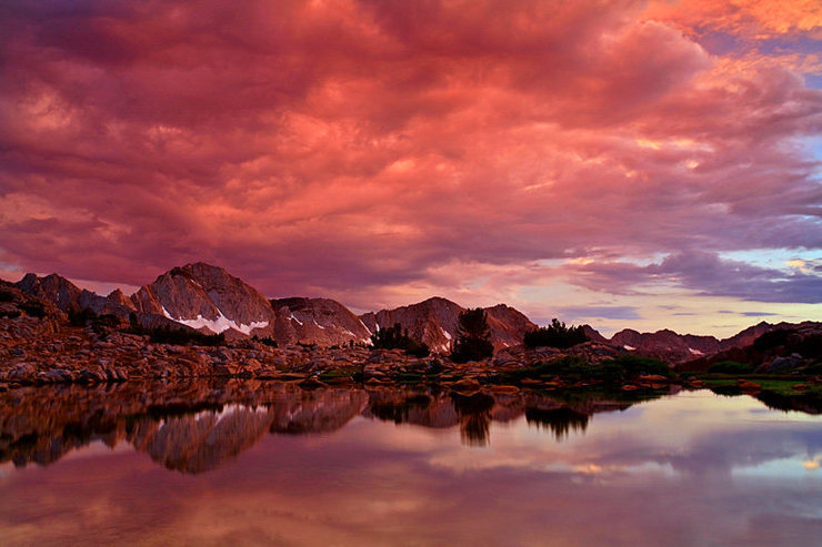Incredible sunset after a typical Sierra thunderstorm. Taken from Dusy Basin. In the background is Mt. Giraud - July 2007