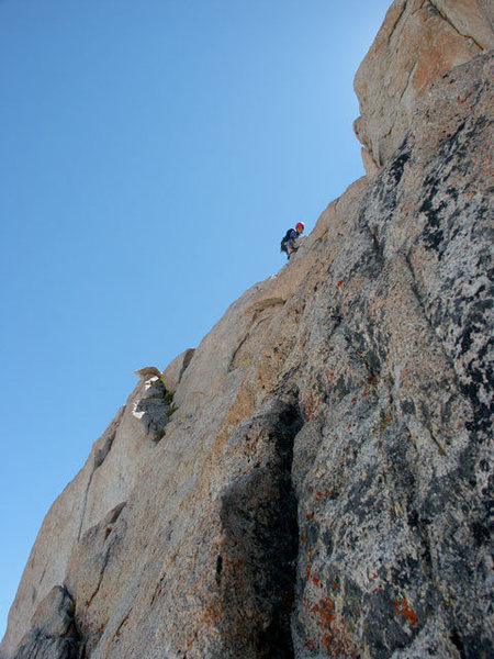 Etsuko is soloing the easy 5th pitch next to the 2nd tower on the East Buttress - July 24, 2004