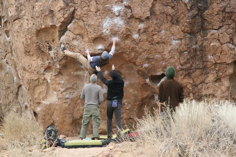 Getting set for the crux on Serengeti, V5.