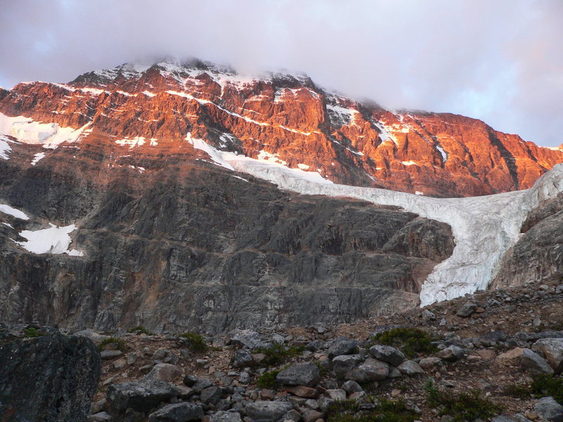 The route takes the buttress in the center of the face.