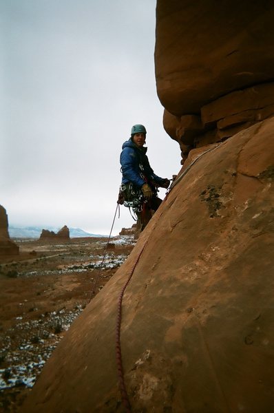 Matt starting pitch 2 and glad that he has his warm coat on.