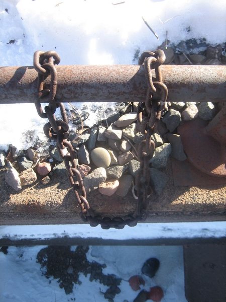 There are four sets of rusty chains atop the climbs. A number of experienced climbers have recommended bringing your own equipment for use as top anchors.