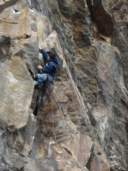 Brian sticking the fingerlock on the lower crux...nice work... First time sending the route and the weatherman said it was 17 degrees...